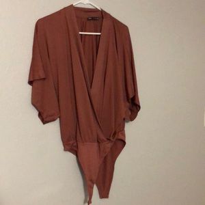 Pink body with big sleeves